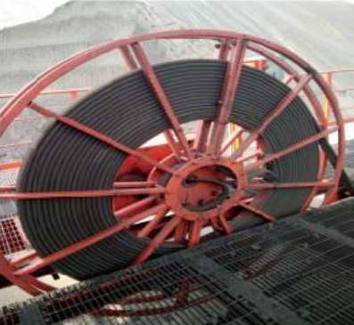 a high-voltage flat cable coiled on a reel.jpg